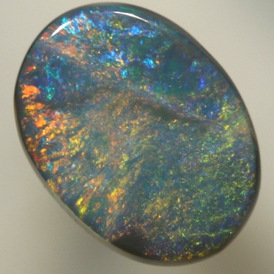 SOLID BLACK OPAL Golden red orange contrasted by turquoise blue. SEE VIDEO